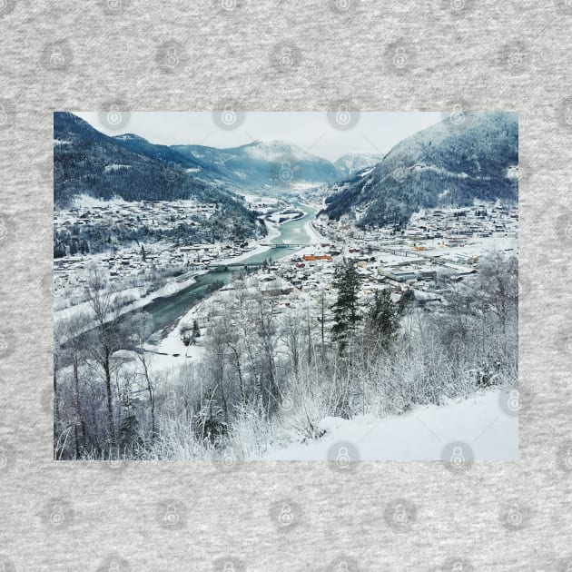 Wintertime - View on Snow-Covered Scandinavian Valley and Town by visualspectrum